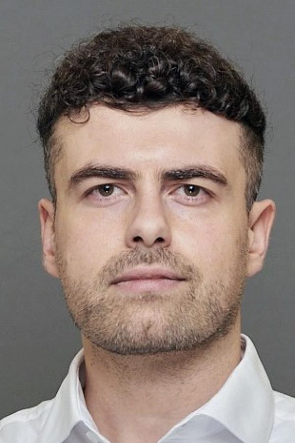 Portrait photo of John Eraifej