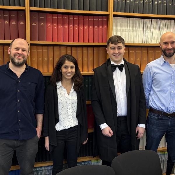 Photo of Isaac Grennan and viva voce examiners.