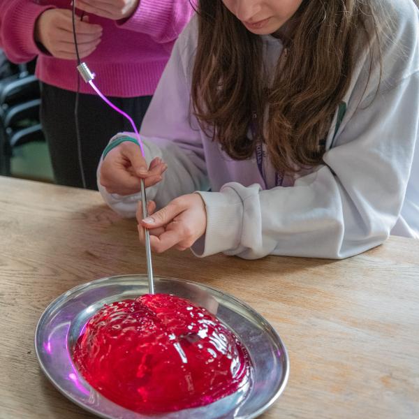 Photo of school pupil visiting the MRC BNDU.