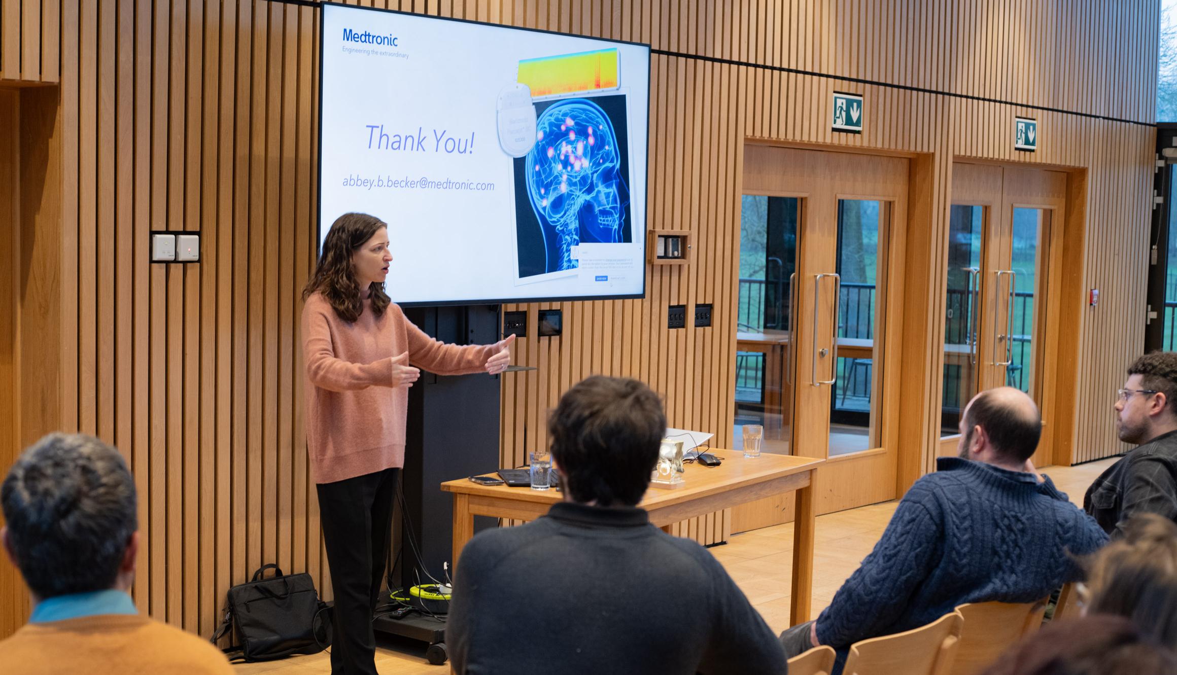 A photo of Abbey Holt Becker presenting her talk to the Unit.