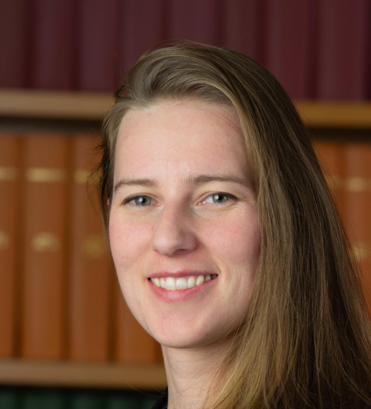 A portrait photo of Demi Brizee.