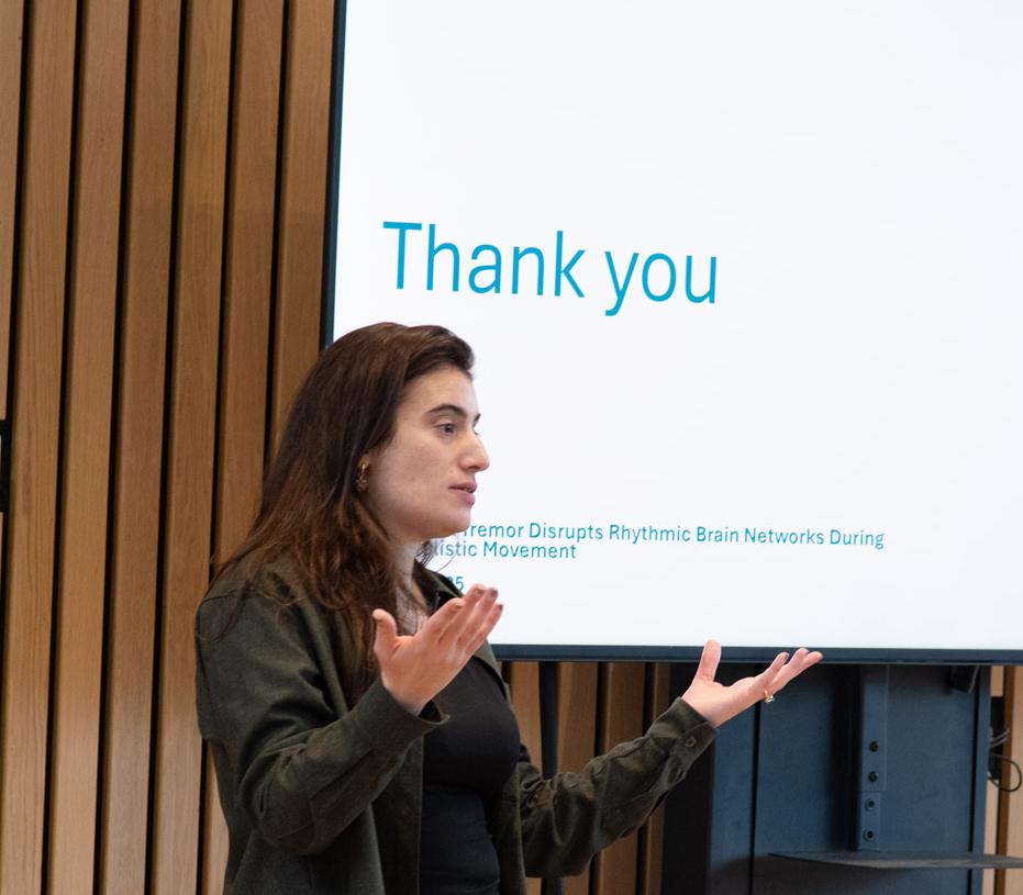 A photo Hayriye Cagnan presenting her research to the Unit.