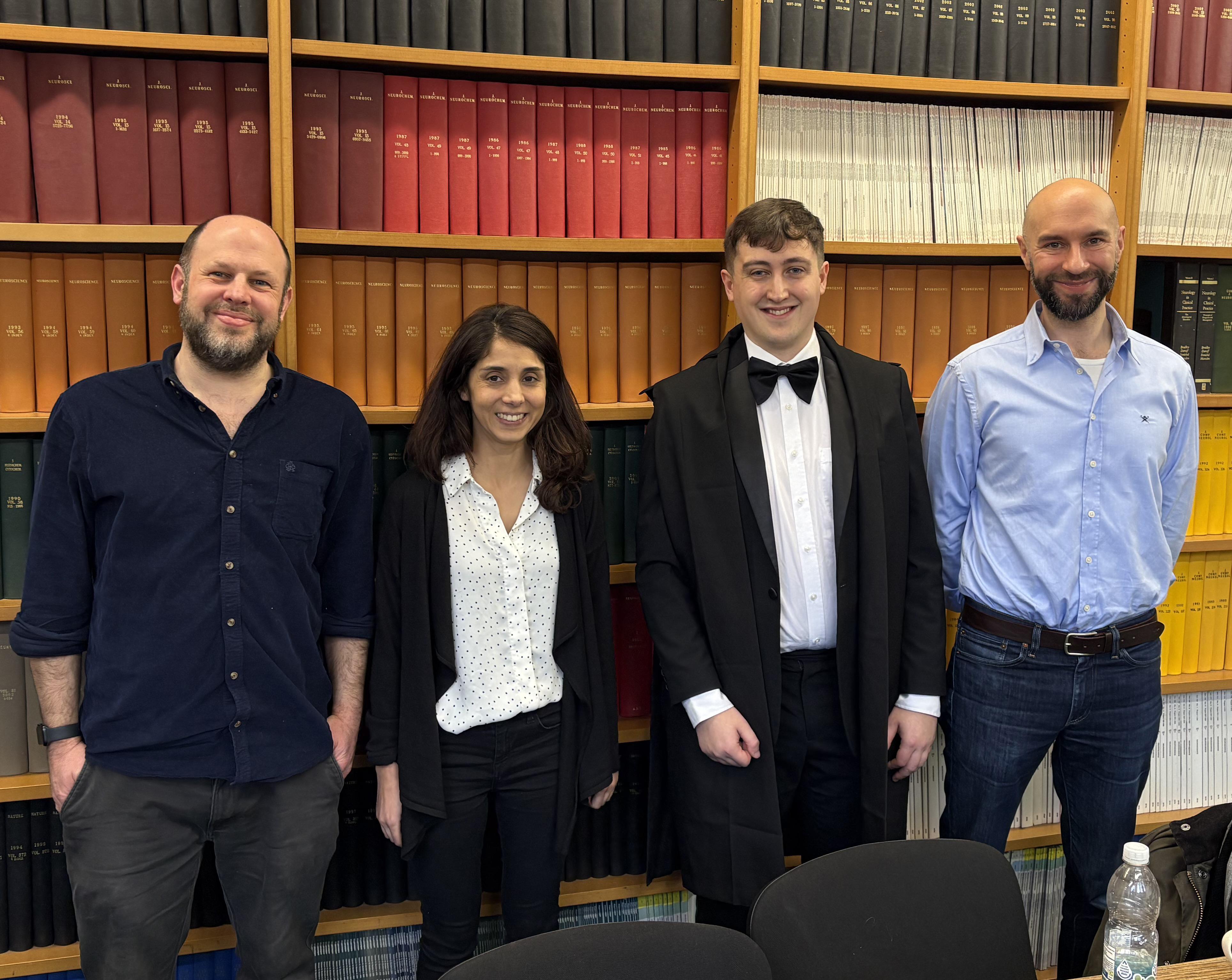 Photo of Isaac Grennan and viva voce examiners.