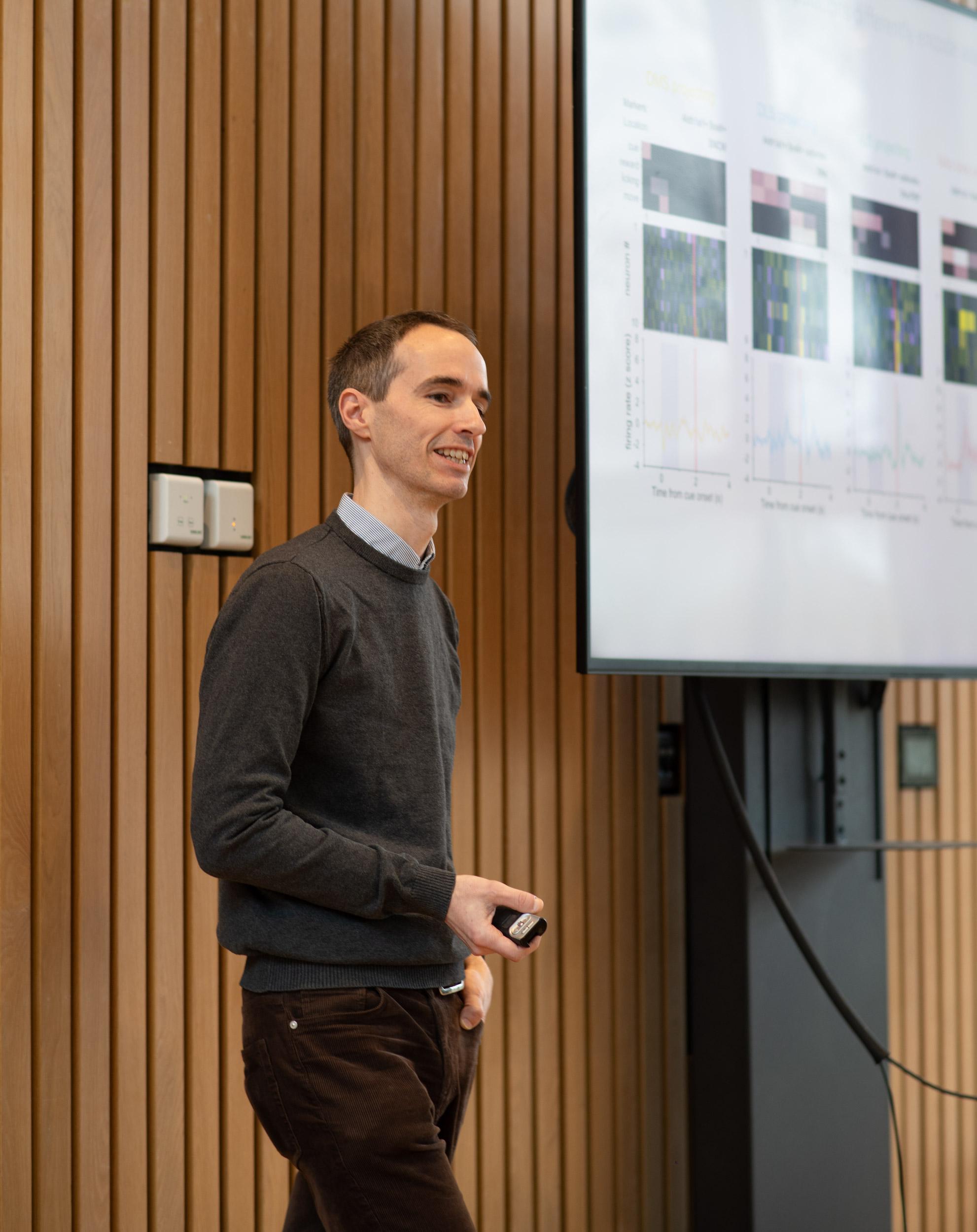 A photo Paul Dodson presenting his research to the Unit.