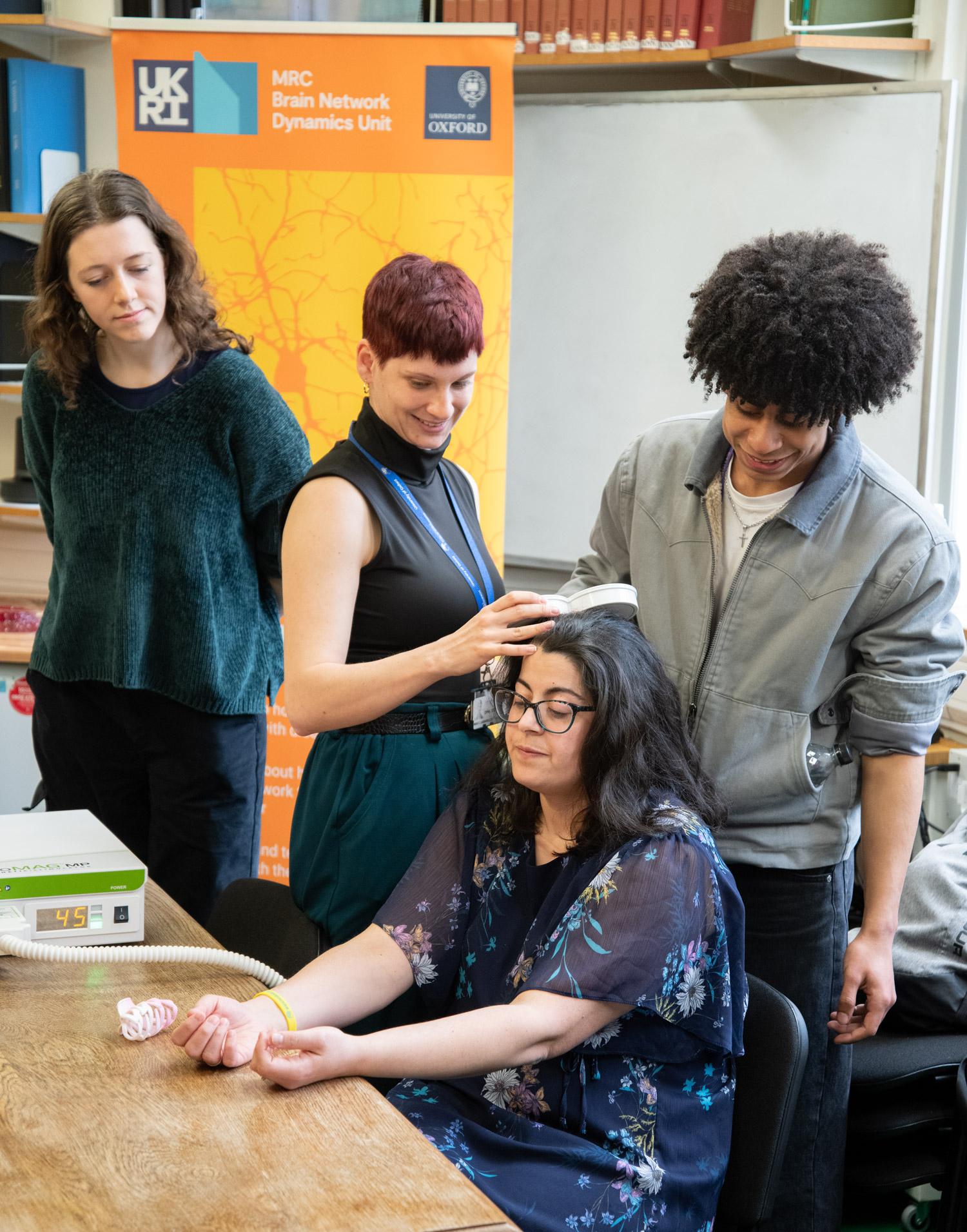 Photo of a Transcranial Magnetic Stimulation demonstration during the MRC BNDU’s Schools Open Day.