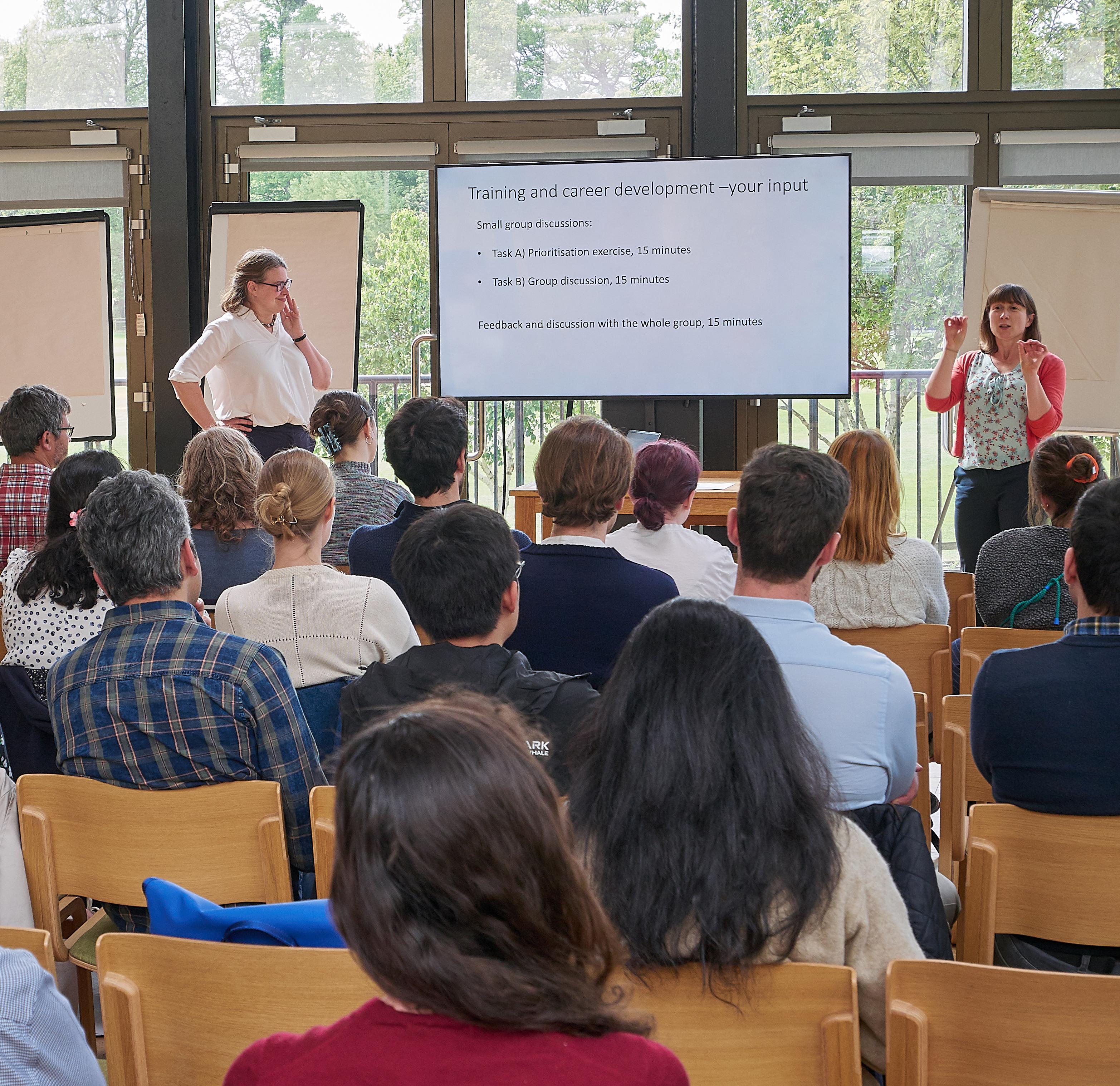 Photo of Mary Myers talking to the audience at the Unit Training and Careers Development Event 2025.