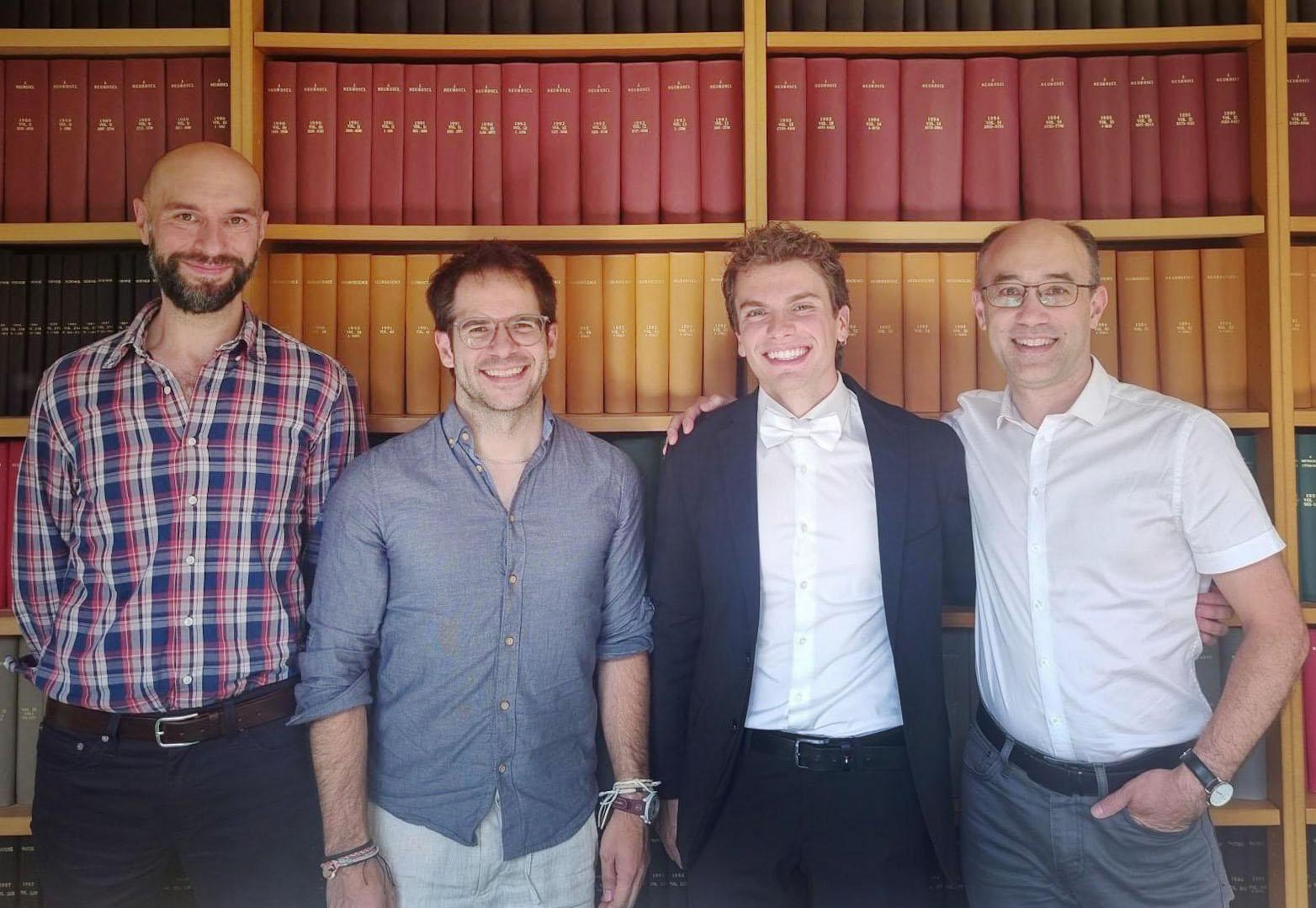 Photo of Manfredi Castelli with supervisor and viva voce examiners.